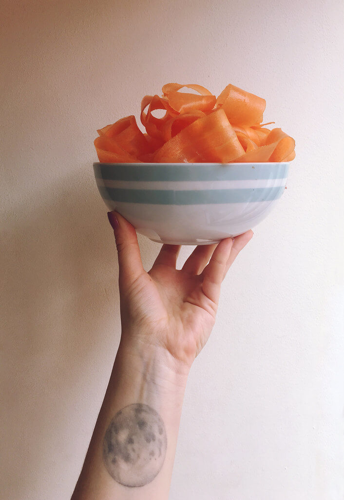 Carrot peelings in a bowl