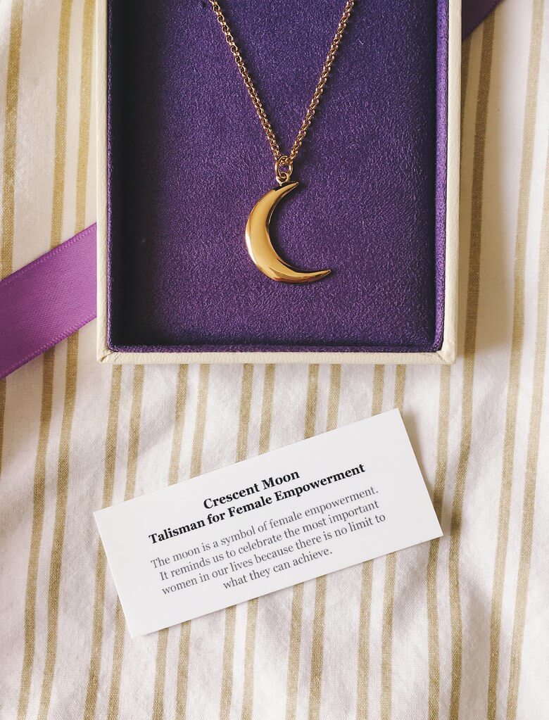 Muru Jewellery moon necklace in box with purple ribbon