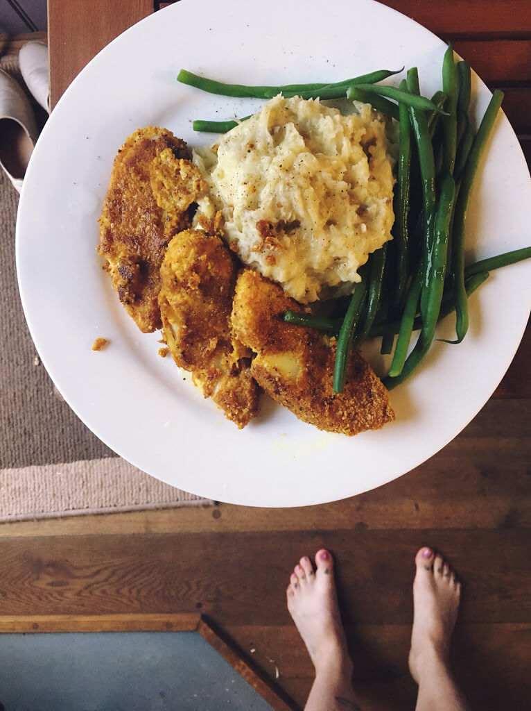 Homemade fish fingers with mashed potato and green beans