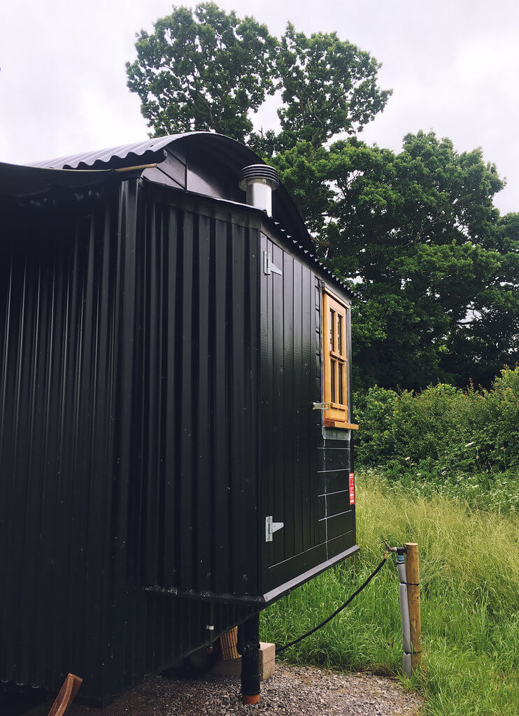 Stay in a shepherds hut in Dorset, a Plankbridge shepherds hut at colber farm