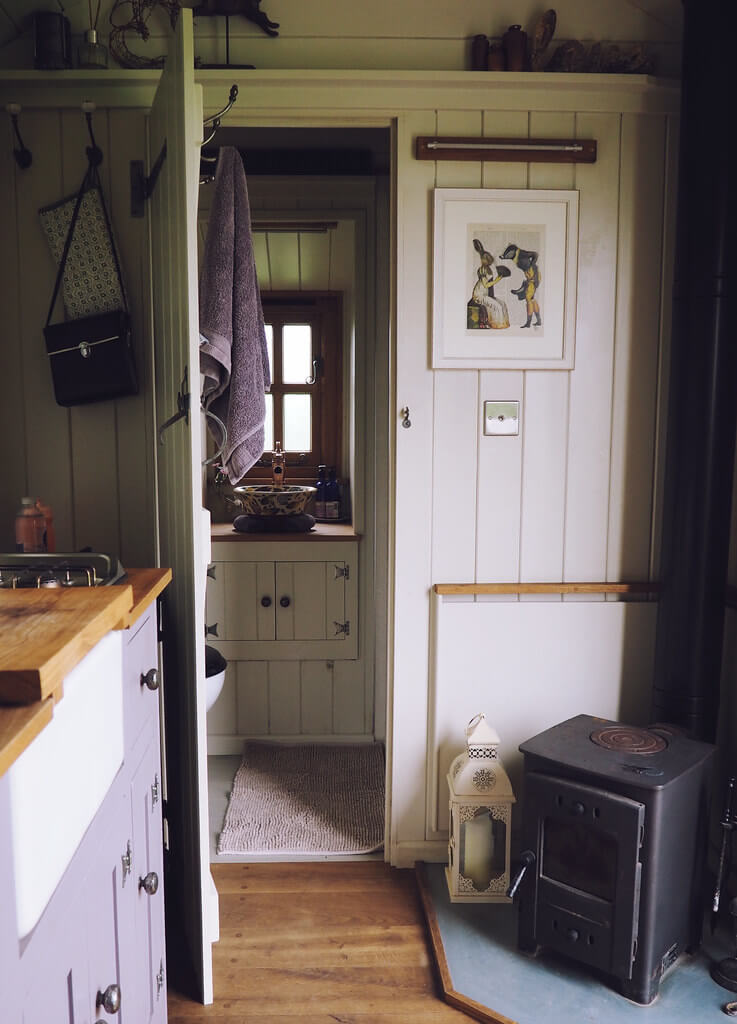 Inside a shepherds hut in Dorset, a Plankbridge shepherds hut at colber farm