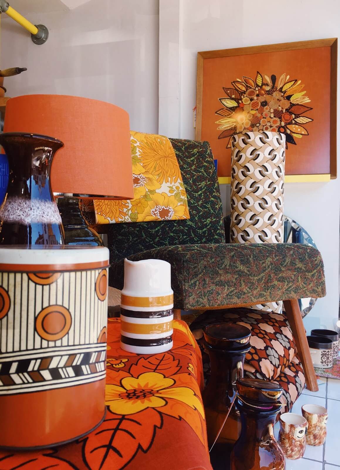 Colourful 70s vintage furniture in the window at Rhubarb Jumble in Bristol