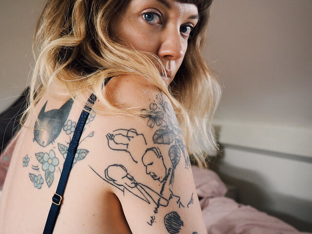 Lyzi Unwin tattoos and navy blue lingerie