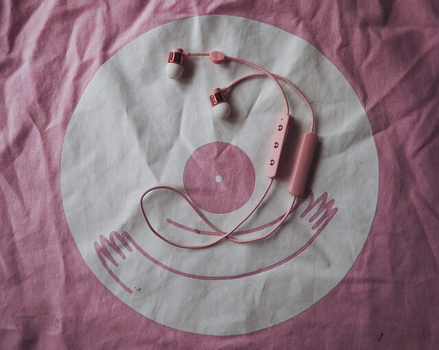 Pink record store tote bag with Sudio headphones