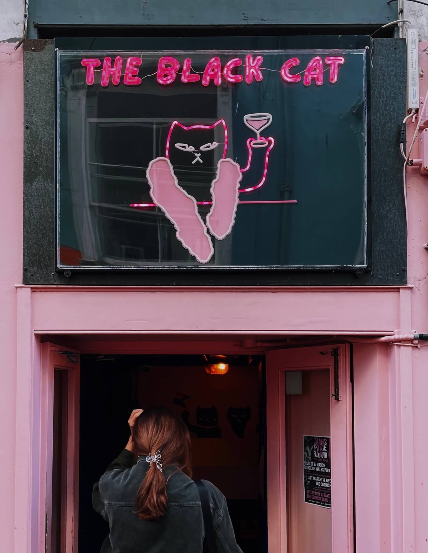 The Black Cat neon bar sign in Falmouth