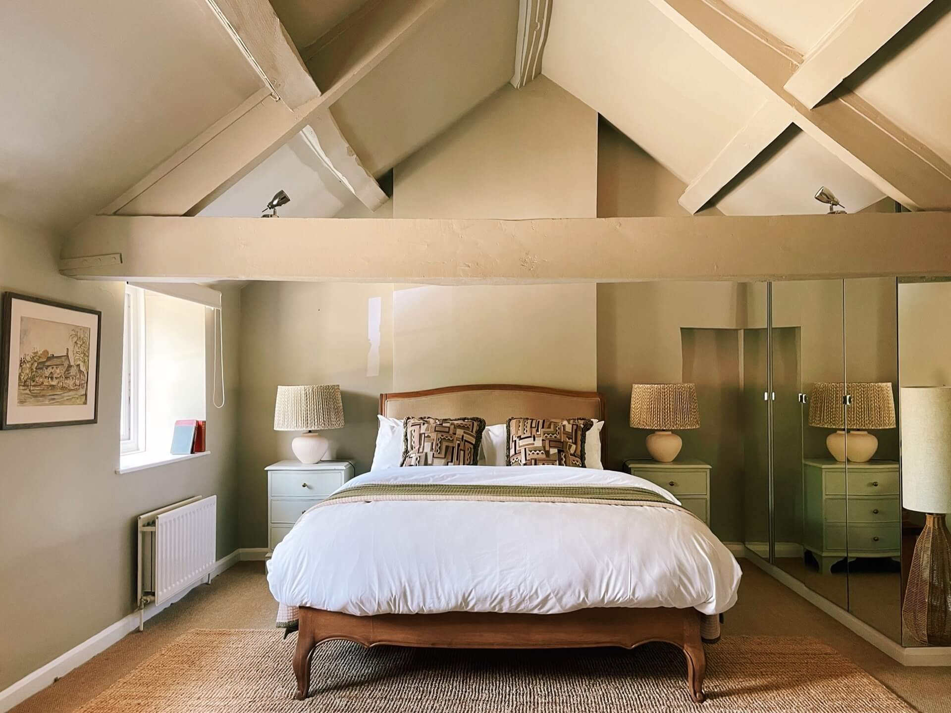 Bedroom in the eaves of the cottage at Church Farm Estate