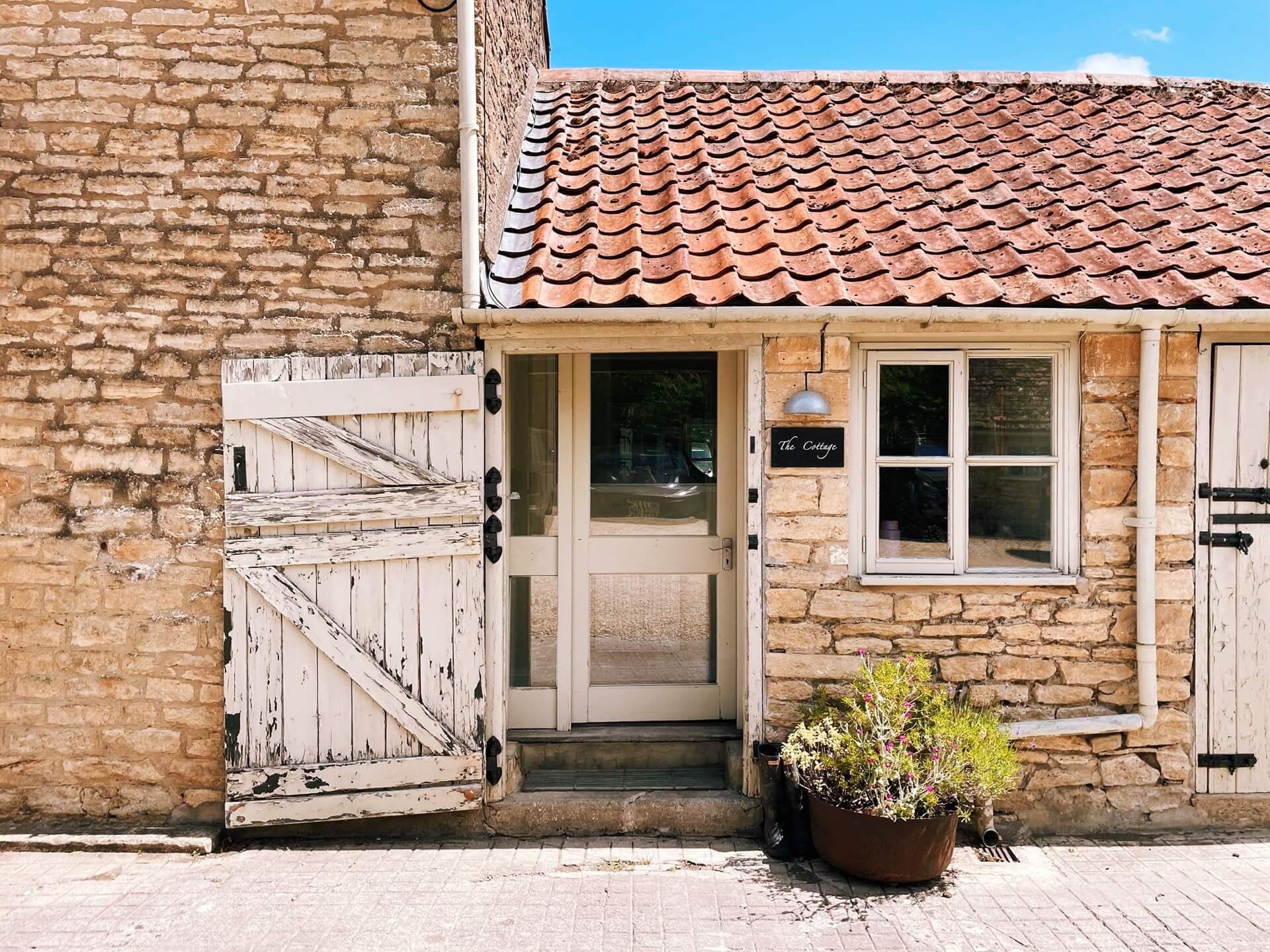 The front door of the cottage at Church Farm Estate