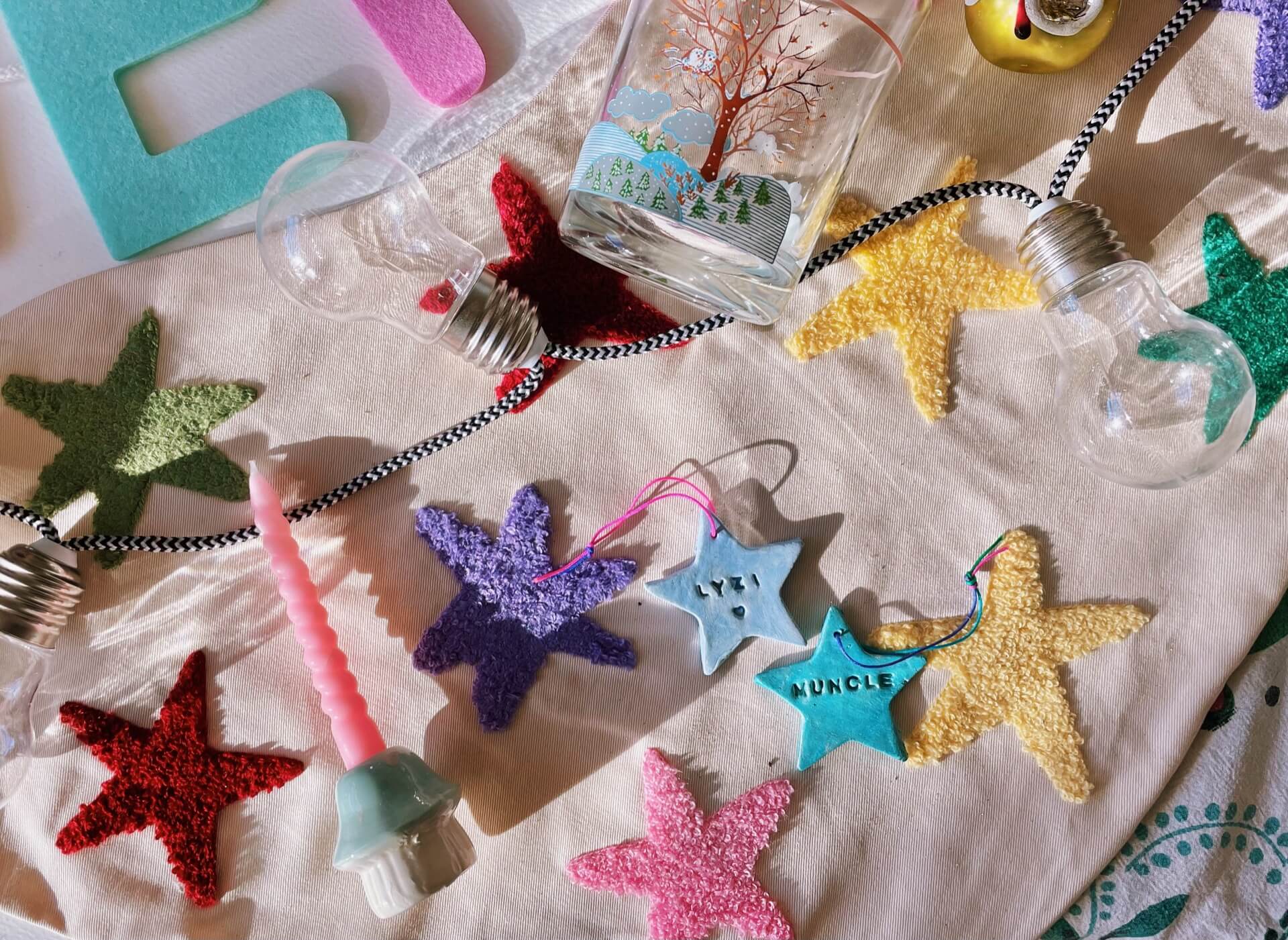 Flatlay of colourful sustainable Christmas decorations and gifts